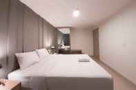 Kamar Tidur Homey and Gorgeous 1BR Mataram City Apartment By Travelio