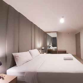 Bedroom 1 Homey and Gorgeous 1BR Mataram City Apartment By Travelio, Hotel Dimas Diajeng Sleman