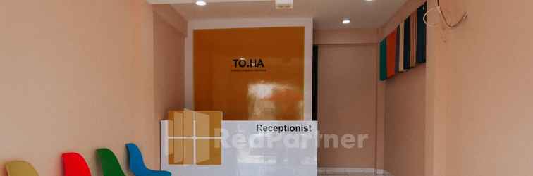 Lobi RedLiving Apartemen Riverview Residence - TOHA Room Tower Mahakam