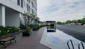 Swimming Pool 6 Cozy Living and Warm 2BR Serpong Garden Apartment By Travelio