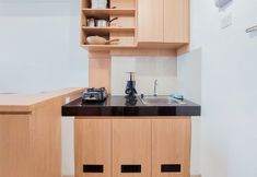 共用スペース 4 Cozy Living and Warm 2BR Serpong Garden Apartment By Travelio