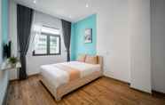Phòng ngủ 5 Cozrum Homes - Cozytel Residence