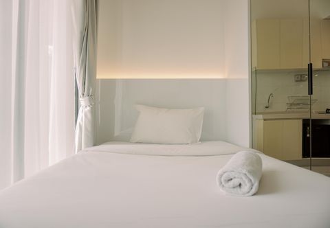 Bedroom Enjoy Living and Simply Studio Sky House BSD Apartment By Travelio