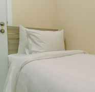 Bedroom 2 Simply and Comfort 2BR at Green Pramuka City Apartment By Travelio