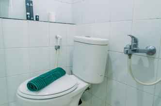 In-room Bathroom 4 Simply and Comfort 2BR at Green Pramuka City Apartment By Travelio