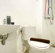 In-room Bathroom 3 Cozy and Best Deal Studio Tamansari Mahogany Karawang Apartment By Travelio