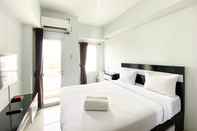 Kamar Tidur Cozy and Best Deal Studio Tamansari Mahogany Karawang Apartment By Travelio