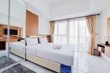 Bedroom Enjoy and Warm Living Studio Casa de Parco Apartment By Travelio