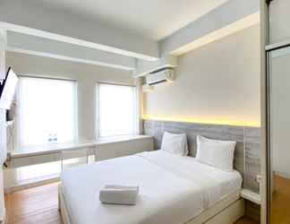 Bedroom 2 Comfy and Modern Look Studio Patraland Urbano Apartment By Travelio