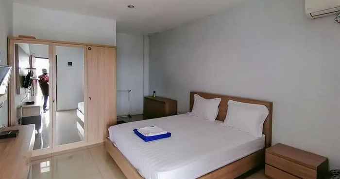 Kamar Tidur LaPonca Residence Pondok Cabe Syariah Mitra RedDoorz