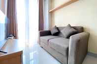 Lobby Homey and Cozy Stay 1BR Vasanta Innopark Apartment By Travelio