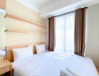 Kamar Tidur 2 Homey and Cozy Stay 1BR Vasanta Innopark Apartment By Travelio