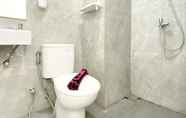 In-room Bathroom 5 Combined 2BR Sayana Bekasi Apartment By Travelio