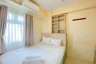 Bedroom Comfy and Great Choice 2BR Green Pramuka City Apartment By Travelio