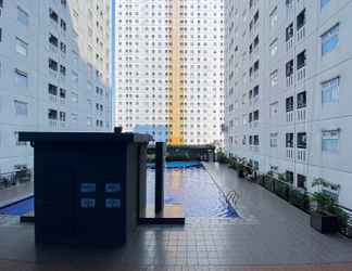 Bangunan 2 Comfy and Great Choice 2BR Green Pramuka City Apartment By Travelio