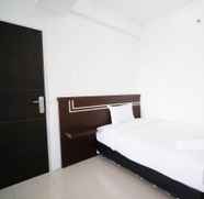 Phòng ngủ 2 Simple 2BR with Extra Bed Menara Rungkut Apartment By Travelio