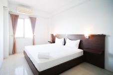 Bedroom Simple 2BR with Extra Bed Menara Rungkut Apartment By Travelio