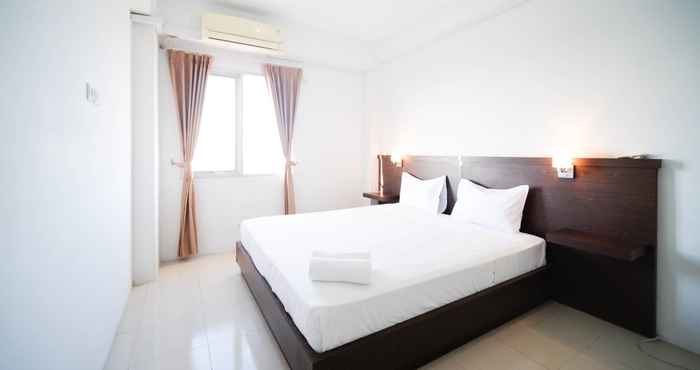 Bedroom Simple 2BR with Extra Bed Menara Rungkut Apartment By Travelio
