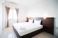 Bedroom Simple 2BR with Extra Bed Menara Rungkut Apartment By Travelio