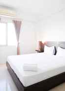 BEDROOM Simple 2BR with Extra Bed Menara Rungkut Apartment By Travelio