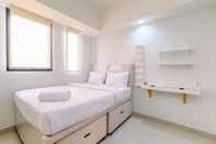 Bedroom Comfortable and Nice 1BR Evenciio Margonda Apartment By Travelio