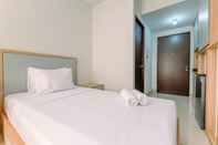 Bedroom Cozy and Enjoy Living Studio Transpark Cibubur Apartment By Travelio