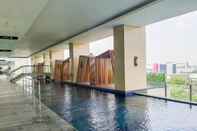 Swimming Pool Comfy and Homey Living Studio Apartment at B Residence By Travelio