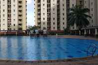 Swimming Pool Comfort Designed 2BR at Mediterania Palace Residence Apartment By Travelio