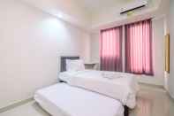 Kamar Tidur Nice and Comfortable Studio Evenciio Margonda Apartment By Travelio