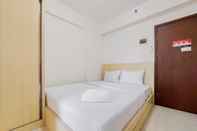 Kamar Tidur Simply Stay Studio Apartment at Loftvilles City By Travelio