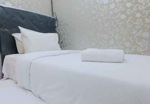 Bedroom Strategic 2BR at Gateway Ahmad Yani Cicadas Apartment By Travelio