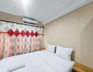 Bedroom 2 Homey and Comfort Studio Skyview Medan Apartment By Travelio