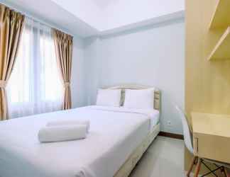 Bedroom 2 Cozy Living 2BR at Royal Heights Apartment By Travelio