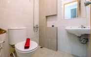 In-room Bathroom 6 Cozy Living 2BR at Royal Heights Apartment By Travelio