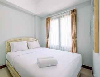 Bedroom 2 Cozy and Comfort 2BR Royal Heights Apartment By Travelio