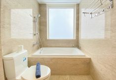 In-room Bathroom 5 Homey and Nice 2BR Apartment at Menteng Park By Travelio