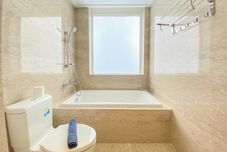 In-room Bathroom Homey and Nice 2BR Apartment at Menteng Park By Travelio