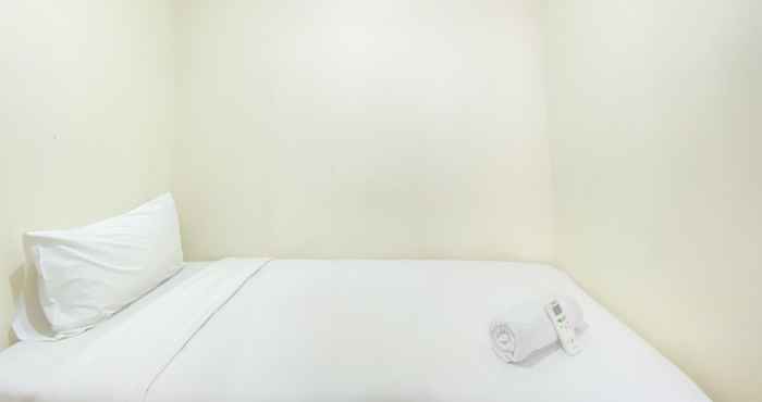 Kamar Tidur Homey and Nice 2BR Apartment at Menteng Park By Travelio