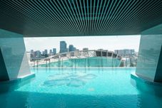 Swimming Pool Homey and Nice 2BR Apartment at Menteng Park By Travelio