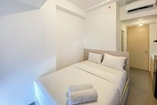 Bedroom Homey and Warm Studio Tokyo Riverside PIK 2 Apartment By Travelio