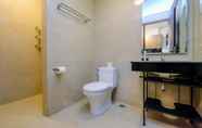 In-room Bathroom 6 Strategic and Good Deal 1BR L'Avenue Apartment By Travelio
