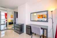 Others Strategic and Good Deal 1BR L'Avenue Apartment By Travelio