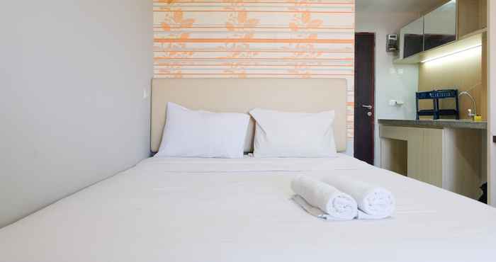 Bedroom Homey Studio Room at Apartment Emerald Towers Bandung By Travelio