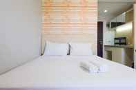 Bedroom Homey Studio Room at Apartment Emerald Towers Bandung By Travelio