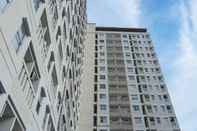 Luar Bangunan Simply Look and Homey Studio Belmont Residence Puri Apartment By Travelio