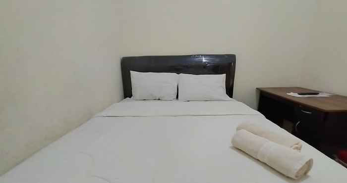 Bedroom Homestay Danesti Syariah Near Bandara Sultan Hasanuddin Mitra RedDoorz