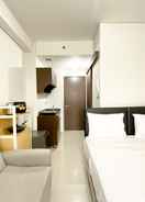 BEDROOM Homey and Good Choice Studio Transpark Cibubur Apartment By Travelio