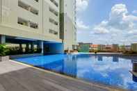 Swimming Pool Cozy Stay and Homey 1BR Loftvilles City Apartment By Travelio