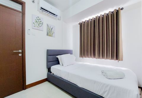Bedroom Cozy Stay and Homey 1BR Loftvilles City Apartment By Travelio