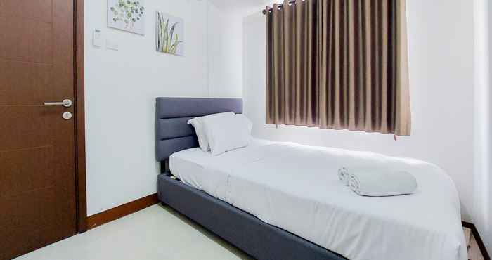 Bedroom Cozy Stay and Homey 1BR Loftvilles City Apartment By Travelio